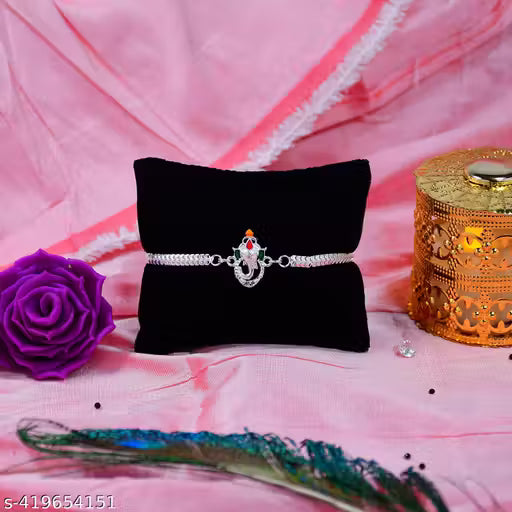 Multicolor Rakhi Combo With Dish, Silver Color Pooja Coin, Roli Chawal & Greeting Card